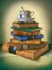stack of books with tea cup